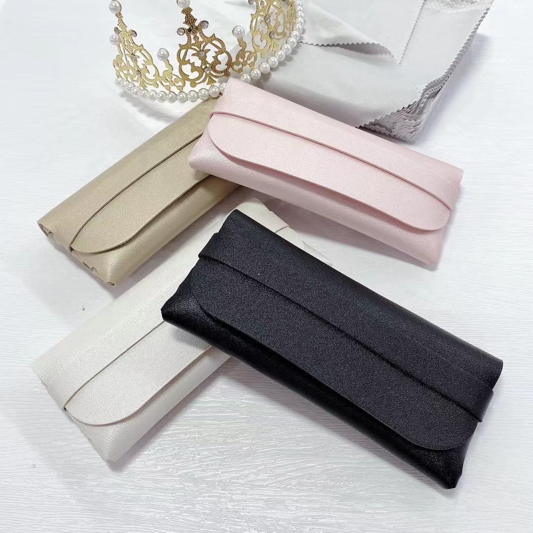 Elegant PU sunglasses box storage in four colors: black, pink, gold, and white, perfect for organizing eyewear.
