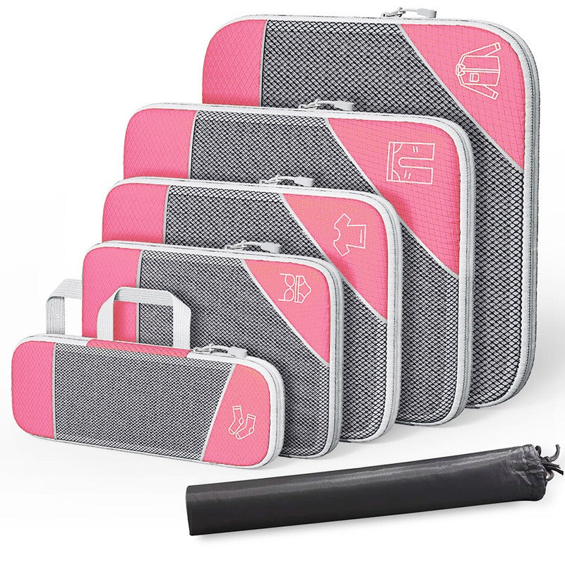 Travel compressible storage bag set in pink and gray, ideal for organizing luggage and home items.