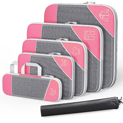 Travel compressible storage bag set in pink and gray, ideal for organizing luggage and home items.