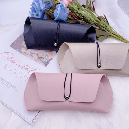 Stylish PU sunglasses storage box in black, beige, and pink, perfect for organizing eyewear and adding elegance to your space.