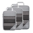 Travel compressible storage bag set in gray with mesh design, ideal for organizing clothes and accessories during travel.