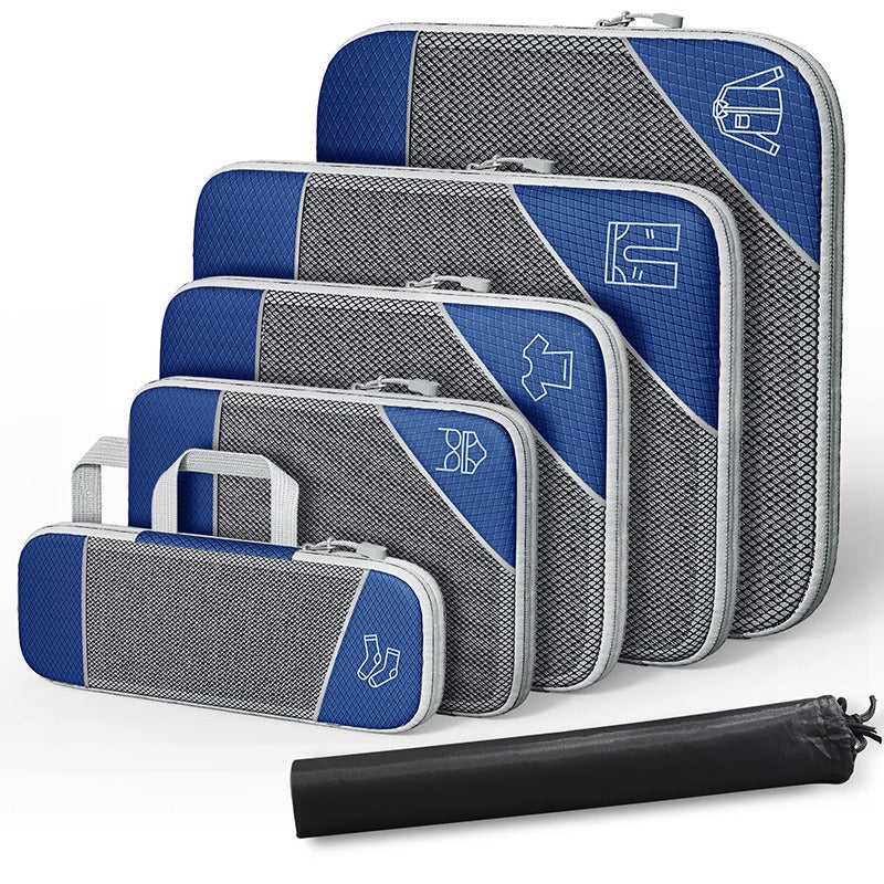 Travel compressible storage bag set in blue and gray, featuring multiple sizes for organizing clothing and accessories.