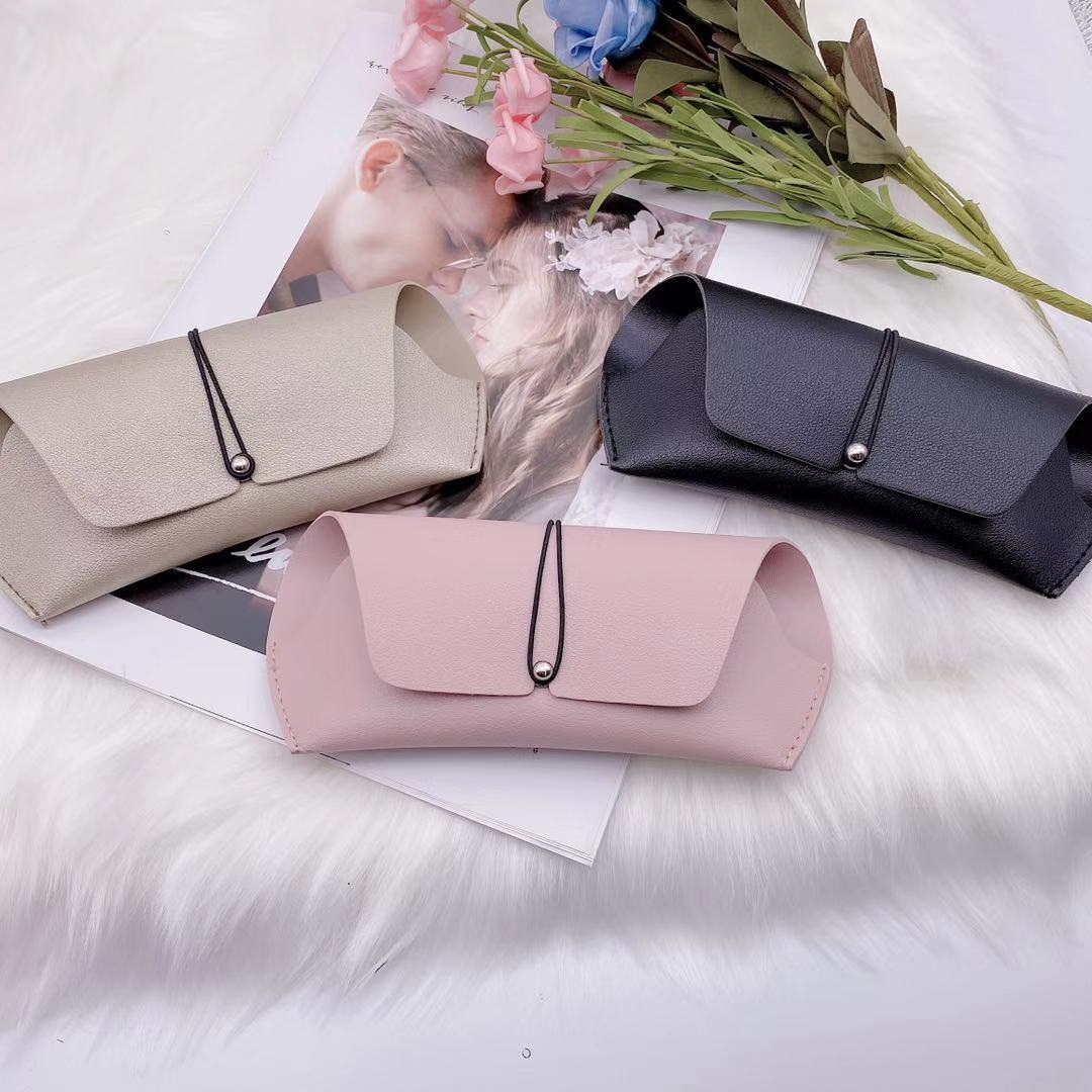 Stylish PU sunglasses box storage in three colors: beige, black, and pink, perfect for organizing eyewear.