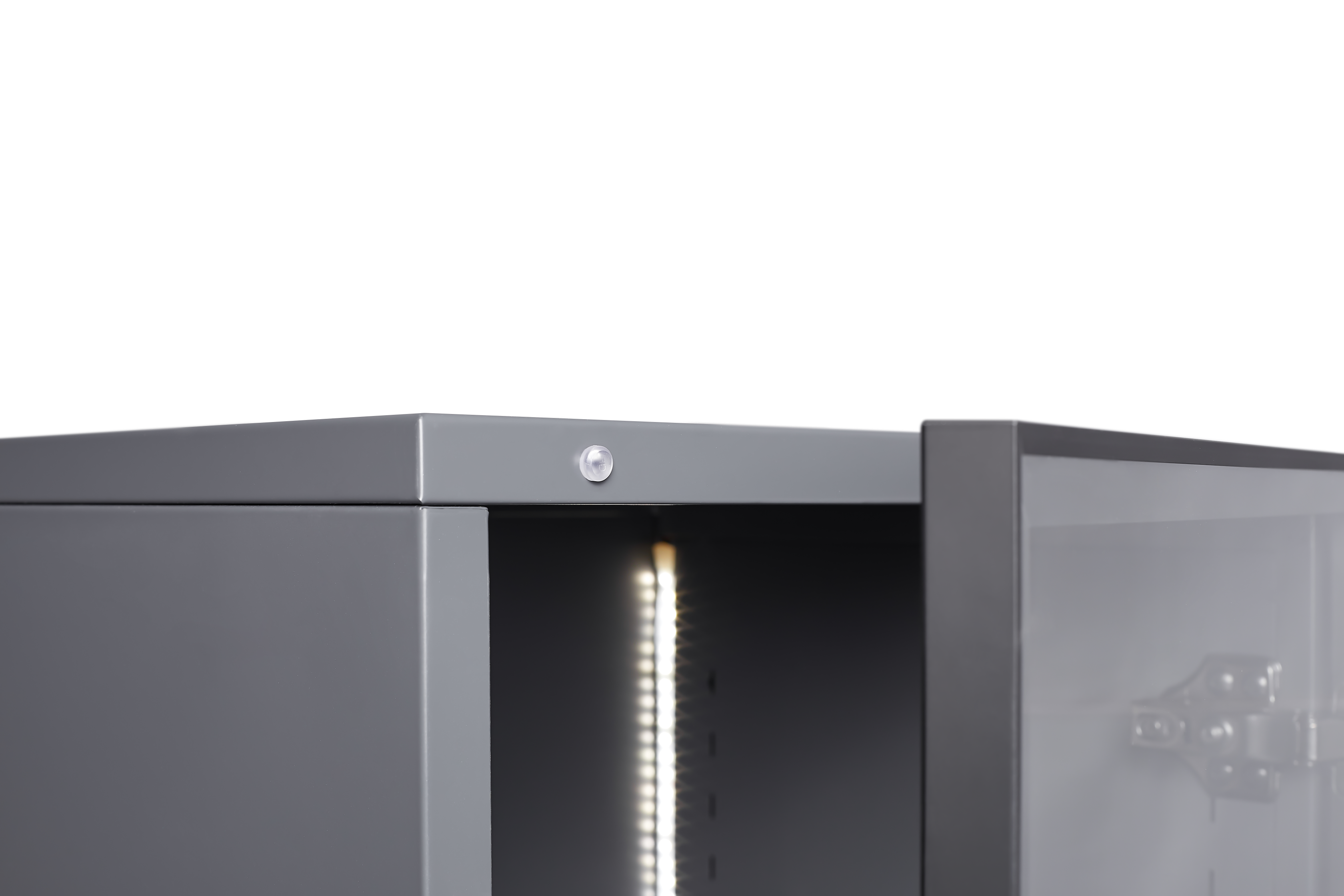 Close-up of a modern grey display storage cabinet showcasing interior LED lighting and sleek metal design.