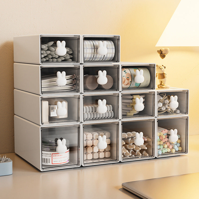 Large capacity plastic desktop storage box with cute bunny handles, organized compartments for office supplies and accessories.