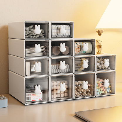 Large capacity plastic desktop storage box with cute bunny handles, organized compartments for office supplies and accessories.