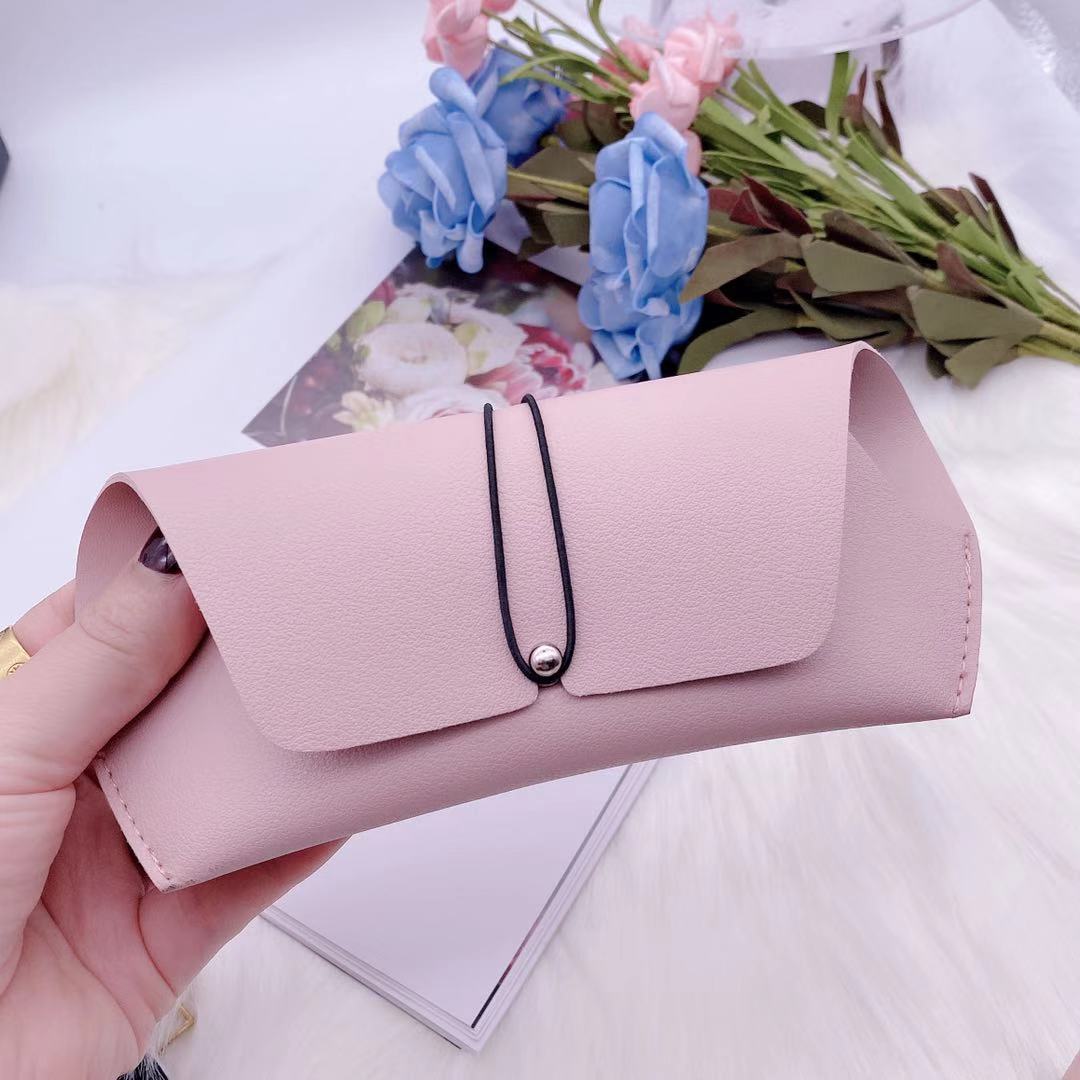 Stylish pink PU sunglasses box for storage, featuring a secure closure and elegant design, perfect for protecting eyewear.