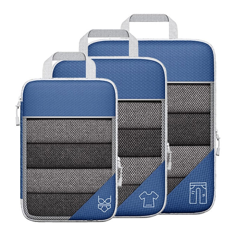 Travel compressible storage bag set in blue and gray, perfect for organizing clothing and accessories while traveling.